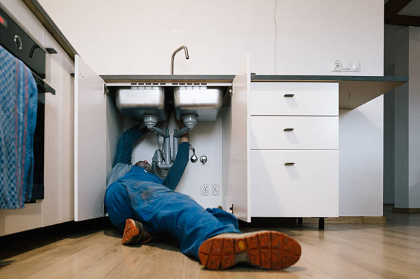 Professional Drain Cleaning technician working in White Mills, KY